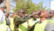 Khartoum State Governor Ahmed Osman Hamza (L, Front) administers the cholera vaccine to a man during a cholera vaccination campaign in Omdurman city, north of Khartoum, Sudan, on June 11, 2025. (Khartoum State Health Ministry/Handout via Xinhua)

