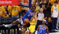 Jalen Williams #8 of the Oklahoma City Thunder drives to the basket against Bennedict Mathurin #00 of the Indiana Pacers during the fourth quarter in Game Four of the 2025 NBA Finals at Gainbridge Fieldhouse on June 13, 2025 in Indianapolis, Indiana. (Photo by Maddie Meyer / GETTY IMAGES NORTH AMERICA / Getty Images via AFP)
