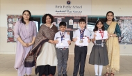  BPS staff and students with the certificates from the exams.