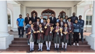 Birla Public School staff and students with the awards