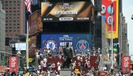Advertising for the FIFA Club World Cup final match between France's Paris Saint Germain and England痴 Chelsea is displayed on a screen at Times Square in New York on July 12, 2025. (Photo by JUAN MABROMATA / AFP)
