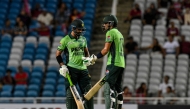 Hasan Nawaz (L) and Hussain Talat (R) of Pakistan celebrate a 100-run partnership during the ODI cricket match between West Indies and Pakistan on August 8, 2025. (Photo by Randy Brooks / AFP)
 