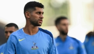 Tottenham Hotspur's Argentinian defender #17 Cristian Romero attends a training session at Friuli stadium, in Udine, on August 12, 2025, on the eve of the 2025 UEFA Super Cup final football match between Paris Saint-Germain (PSG) and Tottenham Hotspur FC. (Photo by Marco BERTORELLO / AFP)