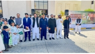 Pakistan Embassy officials with community members at the event yesterday. 