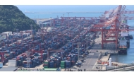 Containers are waiting to be shipped at a port in the southeastern city of Busan, South Korea.