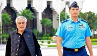 In this handout photograph taken and released by Pakistan's Ministry of Foreign Affairs on August 23, 2025, Pakistan's Foreign Minister Ishaq Dar (L) departs for Bangladesh. (Photo by HANDOUT / Pakistan's Ministry of Foreign Affairs / AFP) 