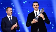 UEFA President Aleksander Ceferin (left) applauds AC Milan’s Swedish senior advisor Zlatan Ibrahimovic ahead of the draw ceremony for the group stage of the 2025-2026 UEFA Champions League at the Grimaldi Forum in Monaco yesterday. 