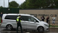 A vehicle believed to be carrying Swedish striker Alexander Isak, passes through security at Liverpool's Melwood training ground in Liverpool, north-west England on September 1, 2025, transfer deadline day. Photo by Paul ELLIS / AFP
