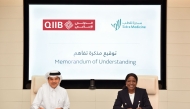 CEO of Sidra Medicine Dr. Iyabo Tinubu-Karch and CEO of QIIB Dr. Abdulbasit Al-Shaibei during the signing of MoU. 