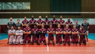 Qatar volleyball team players and officials pose for a photograph in this file photo.