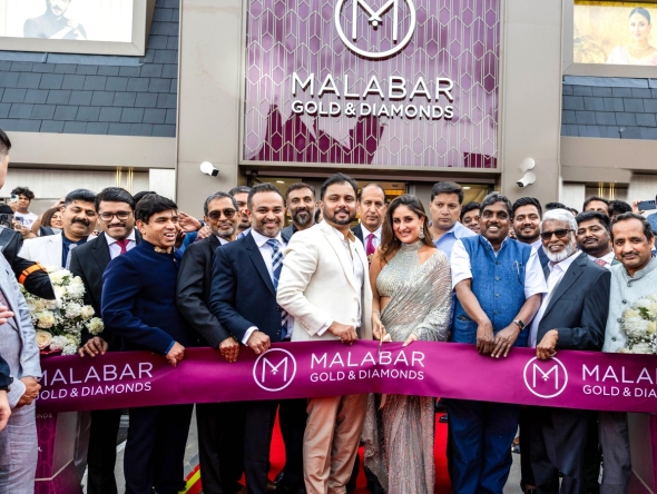 Bollywood actress and brand ambassador of Malabar Gold & Diamonds, Kareena Kapoor Khan with other officials during the inauguration of Birmingham showroom. 