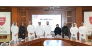 SOP Organizing Committee Chairman Sheikh Khalifa bin Khalid Al Thani poses for a photo with officials.