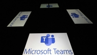 This photograph shows screens displaying the logo of Teams, a collaboration application developed by Microsoft, offering workspace chat and video conferencing, file storage, and integration of proprietary and third-party applications and services in Toulouse, southern France, on January 15, 2025. Photo by Lionel BONAVENTURE / AFP