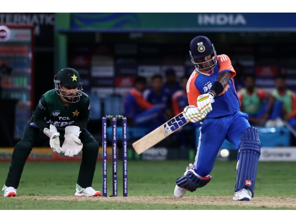 India's captain Suryakumar Yadav plays a shot during the Asia Cup 2025 Twenty20 international cricket match between India and Pakistan at the Dubai International Stadium in Dubai on September 14, 2025. (Photo by Fadel SENNA / AFP)
