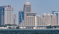 The Sheraton Grand Doha Resort and Convention Hotel (C), the venue for the 2025 Arab–Islamic extraordinary summit, is pictured in Doha on September 15, 2025. Photo by Mahmud Hams/ AFP