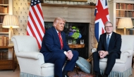 Britain's Prime Minister Keir Starmer and US President Donald Trump sit down for a bilateral meeting at Chequers, in Aylesbury, central England, on September 18, 2025. (Photo by Ian Vogler / POOL / AFP)
