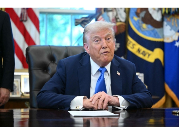 US President Donald Trump speaks before signing executive orders in the Oval Office at the White House in Washington, DC, on September 19, 2025. (Photo by Mandel Ngan/ AFP)