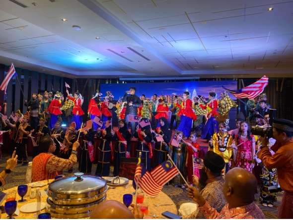 Attendees dressed in traditional attire during the Malaysia National Day and Malaysia Day celebration in Doha on Friday.