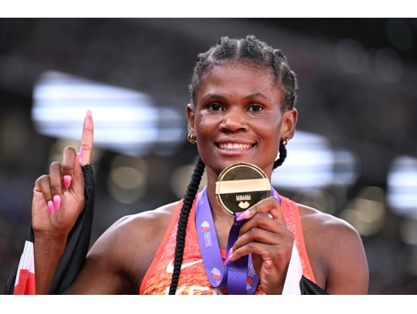 Gold medallist Kenya's athlete Lilian Odira celebrates after winning the women's 800m final during the World Athletics Championships in Tokyo on September 21, 2025. (Photo by Kirill Kudryavtsev / AFP)
