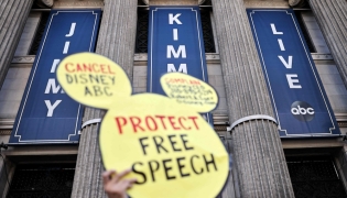 A demonstrator waves a 