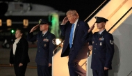 US President Donald Trump walks off Air Force One after arriving at John F. Kennedy International Airport on September 22, 2025 in New York City. Chip Somodevilla/Getty Images/AFP