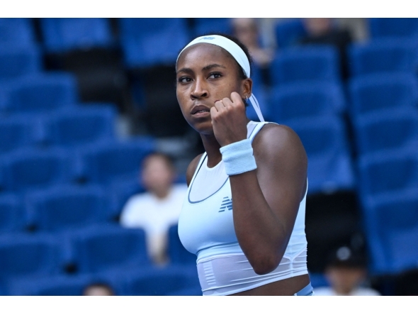 USA's Coco Gauff reacts after victory against Switzerland's Belinda Bencic during their women's singles match at the China Open tennis tournament on September 30, 2025. (Photo by Wand Zhao / AFP)