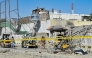 Security personnel inspect an explosion site outside the Frontier Corps (FC) headquarters in Quetta on September 30, 2025. (Photo by Banaras KHAN / AFP)