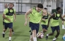 Al Kharaitiyat players take part in a training session.