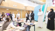 Prime Minister and Minister of Foreign Affairs H E Sheikh Mohammed bin Abdulrahman bin Jassim Al-Thani and Minister of Education and Higher Education H E Lolwah bint Rashid bin Mohammed Al Khater with other officials during an event to mark World Teachers’ Day at Ministry headquarters yesterday.