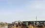 A grab from a UGC video posted on the X platform on August 22, 2023 reportedly shows members of the Sudanese army firing at Rapid Support Forces (RSF) fighters in what they say is the al-Shajara military base in Khartoum. (Photo by UGC / AFP)