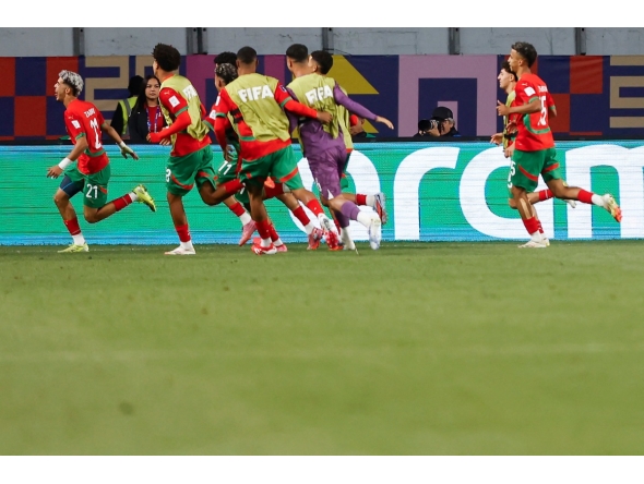 Morocco's foward #21 Yassir Zabiri celebrates scoring his team's second goal during the 2025 FIFA U-20 World Cup round of 16 football match between Morocco and South Korea at El Teniente Stadium in Rancagua, Chile on October 9, 2025. (Photo by Raul BRAVO / AFP)