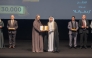 General Manager of the Cultural Village Foundation - Katara Prof. Dr. Khalid bin Ibrahim Al-Sulaiti honouring a winner of the 11th Katara Prize for Arabic Novel 2025 at a ceremony at the Katara Opera House yesterday.