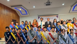 PISQ Principal Ch Muhammad Afzal with other officials and students during the event.