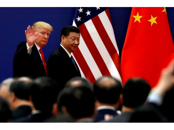 File photo of U.S. President Donald Trump and China's President Xi Jinping meet business leaders at the Great Hall of the People in Beijing, China, November 9, 2017. REUTERS/Damir Sagolj/File Photo
