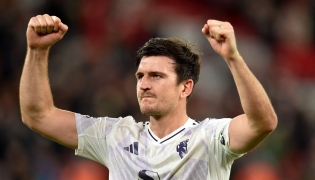 Manchester United's English defender #05 Harry Maguire reacts after the English Premier League football match between Liverpool and Manchester United at Anfield in Liverpool, north west England on October 19, 2025. (Photo by PETER POWELL / AFP) 