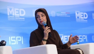 UAE's Minister of State for International Cooperation H E Reem Al Hashimy speaking at the Mediterranean Dialogues Conference in Italy. 