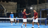 Qatar's players celebrate their victory over Kuwait
