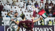 Al Wahda’s Ala Zouhir scores with a spectacular overhead kick.