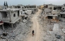 File: This picture taken on March 12, 2020 shows an aerial view of the town of Afis, which has sustained widespread destruction due to heavy fighting and air-strikes by pro-Syrian regime forces, in the northwestern Idlib province. (Photo by Omar Haj Kadour / AFP

