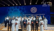 Former Minister of Energy, H E Dr Mohamed bin Saleh Al Sada along with other officials and winners.