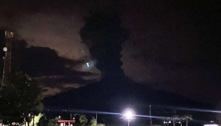 Tall column of ash spewed by Mount Kanlaon Volcano, in the town of La Castellana in Negros Occidental, central Philippines, on October 24, 2025.(Photo by Remuel Lajo/social media)