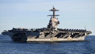 (FILES) The USS Gerald R. Ford, the world's largest aircraft carrier, seen in the North Sea during NATO Neptune Strike 2025 exercise on September 24, 2025 in the North Sea. (Photo by Jonathan KLEIN / AFP)
