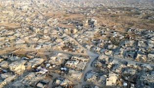 This aerial picture shows destroyed buildings in Gaza City's Al-Remal neighbourhood on October 23, 2025. (Photo by AFP)