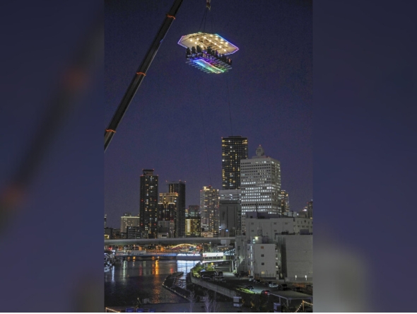 An aerial restaurant in Japan suspended by a crane. (Photo by The Japan News)
