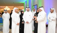 Minister of Public Health H E Mansoor bin Ebrahim bin Saad Al Mahmoud with other officials and participants during the forum.