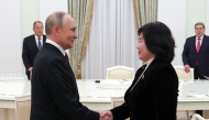 In this pool photograph distributed by the Russian state agency Sputnik, Russia's President Vladimir Putin meets with North Korean Foreign Minister Choe Son-hui in Moscow on October 27, 2025. (Photo by Vyacheslav PROKOFYEV / POOL / AFP)