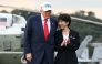US President Donald Trump and Japan's Prime Minister Sanae Takaichi arrive on board the US Navy's USS George Washington aircraft carrier at the US naval base in Yokosuka on October 28, 2025. (Photo by Andrew Caballero-Reynolds / AFP)
