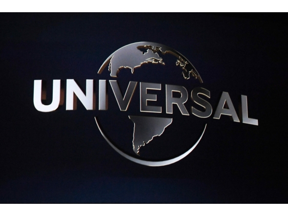 The Universal logo is displayed on a screen during a Universal Studios special presentation during CinemaCon 2022 at Caesars Palace in Las Vegas, Nevada, on April 27, 2022. (Photo by Valerie Macon / AFP)
