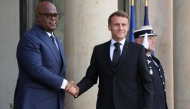 France's President Emmanuel Macron welcomes Democratic Republic of the Congo's President Felix Tshisekedi before a meeting at The Elysee Presidential Palace in Paris on October 30, 2025, on the sidelines of the Paris Peace Forum. (Photo by Ludovic Marin / AFP)