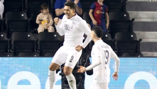 Al Sadd's Roberto Firmino (left) celebrates with teammate Rafa Mujica after scoring a goal against Al Rayyan yesterday. 